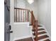 Elegant staircase with dark wood railings and steps at 31 Brittany Ne Way, Atlanta, GA 30324