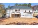 New construction home exterior, partially wrapped at 3740 High Green Drive, Marietta, GA 30068