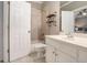 Bathroom with a shower/tub combo and white vanity at 552 Grassmeade Way, Snellville, GA 30078