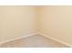 Small bedroom with neutral walls and carpeted floor at 1841 Northwick Pl, Lithonia, GA 30058