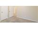 Well-lit bedroom with carpet flooring and neutral walls at 1841 Northwick Pl, Lithonia, GA 30058