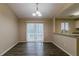 Dining area with sliding glass door leading to the outside at 1841 Northwick Pl, Lithonia, GA 30058