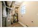 Laundry room with washer and dryer hookups, and water heater at 1841 Northwick Pl, Lithonia, GA 30058