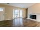 Bright living room featuring bay window and fireplace at 1841 Northwick Pl, Lithonia, GA 30058