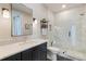 Modern bathroom with a marble shower, quartz vanity, and dark cabinets at 1130 Lupo Loop, Chattahoochee Hills, GA 30268