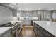 Bright kitchen with white cabinets, herringbone backsplash, and stainless steel appliances at 436 Valley Brook Ne Dr, Atlanta, GA 30342