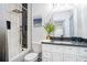 Stylish bathroom featuring a bathtub, shower, and a dark granite vanity at 896 Hollywood Nw Rd, Atlanta, GA 30318