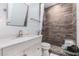 Modern bathroom with wood-look tile shower and updated vanity at 342 Parc Xing, Acworth, GA 30102