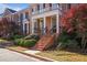 Brick front exterior of charming townhome with manicured landscaping at 5104 Davenport Pl, Roswell, GA 30075