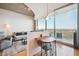 Compact dining area with fold-down table, integrated into living room at 361 17Th Nw St # 2208, Atlanta, GA 30363