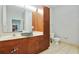 Bathroom with double vanity, linen cabinets, and toilet at 870 Nw Mayson Turner Road # 1127, Atlanta, GA 30314