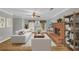 Living room with fireplace, wood flooring, and neutral wall colors at 2701 Treehouse Ln, Lawrenceville, GA 30044