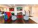 Basement game room featuring hardwood floors, toys, and a staircase at 1560 Tapestry Rdg, Lawrenceville, GA 30045