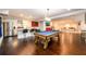 Open basement with pool table, wet bar, and additional living space at 1560 Tapestry Rdg, Lawrenceville, GA 30045