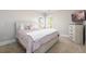 Cozy bedroom with plush carpet, and natural light from large windows at 1560 Tapestry Rdg, Lawrenceville, GA 30045