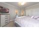 Comfortable bedroom with carpeted floors, and a private ensuite bathroom at 1560 Tapestry Rdg, Lawrenceville, GA 30045