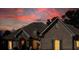 Front exterior of a home at sunset at 1560 Tapestry Rdg, Lawrenceville, GA 30045