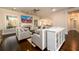 Spacious living area with hardwood floors, a fireplace, and large windows at 1560 Tapestry Rdg, Lawrenceville, GA 30045
