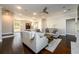 Spacious living room with hardwood floors, plush seating, and stylish decor at 1560 Tapestry Rdg, Lawrenceville, GA 30045