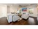 Inviting living room with ample seating, fireplace, and large windows at 1560 Tapestry Rdg, Lawrenceville, GA 30045