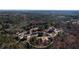 An aerial view showcasing a beautiful neighborhood nestled among trees at 1560 Tapestry Rdg, Lawrenceville, GA 30045