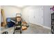 Unfinished storage area with concrete floor and shelving at 1560 Tapestry Rdg, Lawrenceville, GA 30045