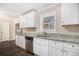 Eat-in kitchen with white cabinets, granite countertops, and stainless steel appliances at 2496 Montezuma Cir, Ellenwood, GA 30294
