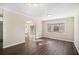 Spacious living room with hardwood floors and bay window at 2496 Montezuma Cir, Ellenwood, GA 30294