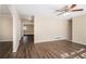 Spacious living room with hardwood floors and an open floor plan at 2496 Montezuma Cir, Ellenwood, GA 30294