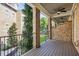 Brick balcony with a view of courtyard and trees at 333 Brownstones Ne Cir, Atlanta, GA 30312