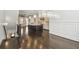 Open concept kitchen and living area with hardwood floors and island at 333 Brownstones Ne Cir, Atlanta, GA 30312