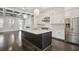 Modern kitchen with white cabinets, quartz countertops, and stainless steel appliances at 333 Brownstones Ne Cir, Atlanta, GA 30312