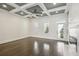 Living Room with hardwood floors, fireplace, and coffered ceiling at 333 Brownstones Ne Cir, Atlanta, GA 30312