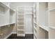 Large walk-in closet with ample shelving and hanging space at 333 Brownstones Ne Cir, Atlanta, GA 30312