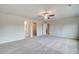 Large bedroom with carpet, ceiling fan and en-suite bathroom at 412 Brekston Way, Mcdonough, GA 30253