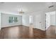 Spacious bonus room with wood-style flooring and abundant natural light at 100 Academy Ln, Canton, GA 30114