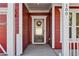 Welcoming front door with a decorative wreath and a 
