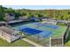 Community tennis courts with covered viewing area at 100 Academy Ln, Canton, GA 30114