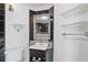 Bathroom with dark tile, a corner vanity, and a shower at 1501 Clairmont Rd # A, Decatur, GA 30033