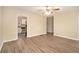Open living room with hardwood floors and a view into the updated kitchen at 2671 Tilson Rd, Decatur, GA 30032