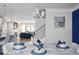 Bright dining area with marble table and seating for four, open to the kitchen at 2042 Violet Ln, Brookhaven, GA 30319