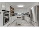 Modern kitchen with stainless steel appliances and white cabinets at 1195 Braselton Hwy, Lawrenceville, GA 30043