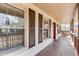 Front porch with rocking chairs and wooden railings at 1195 Braselton Hwy, Lawrenceville, GA 30048