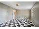 Spacious bedroom with black and white checkered floors at 195 Valley View Dr, Tyrone, GA 30290