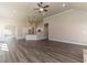 Spacious living room with hardwood floors and a ceiling fan at 1422 Alcovy Station Rd, Covington, GA 30014