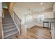 Modern kitchen with white cabinets, granite counters, and stainless steel appliances at 1452 Alcovy Station Rd, Covington, GA 30014