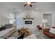 Living room with fireplace and wood accent wall at 96 Whites Pond Rd, Moreland, GA 30259