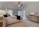 Main bedroom with high ceilings and en suite bathroom access at 96 Whites Pond Rd, Moreland, GA 30259