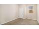 Bright bedroom featuring a closet and window at 195 Pinehurst Dr, Stockbridge, GA 30281