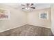 Simple bedroom with neutral walls and carpeted floors at 195 Pinehurst Dr, Stockbridge, GA 30281